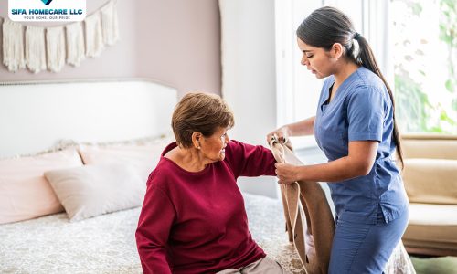 Caregiver providing mobility assistance to an older adult at home in Puyallup, WA